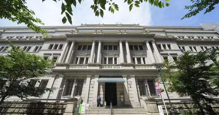 Bank of Japan raises its key interest rate to a three-decade high of 1%, citing inflation