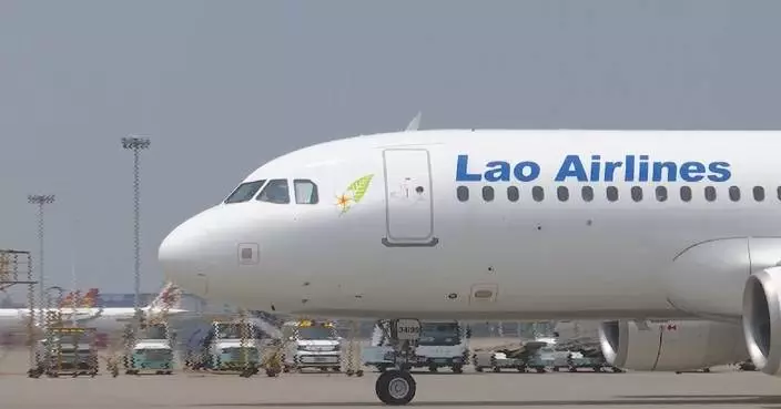 Lao top leader Thongloun arrives in China for state visit