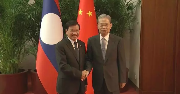 China’s top legislator meets Lao top leader