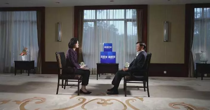 Lao president pledges further technology cooperation with China