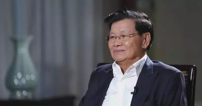 Lao president praises Xi’s initiatives for promoting global peace, equality