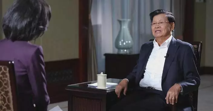 Lao president says he is impressed by, learns from Xi’s works