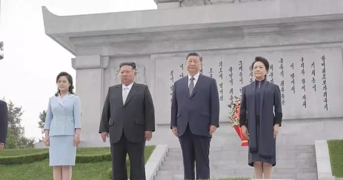 Xi, Kim pledge to carry forward great traditional China-DPRK friendship through generations