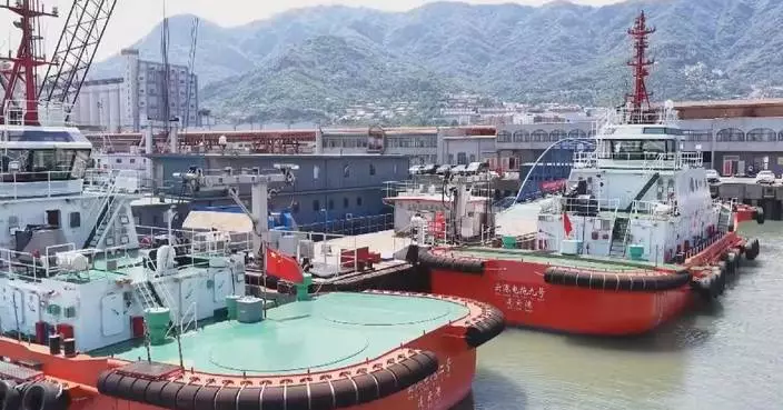 Pure electric tugboat undergoes test to supply power back to grid at east China port