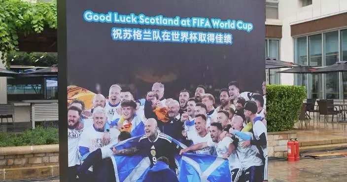 Scotland fans in Beijing rally ahead of first appearance in World Cup since 1998