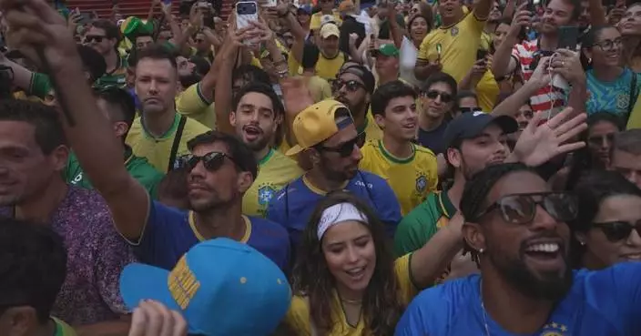 Brazil fans fill Times Square with drum beats, chants ahead of team's World Cup match