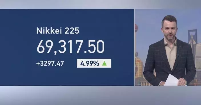 Tokyo stocks end over 69,000 points for first time
