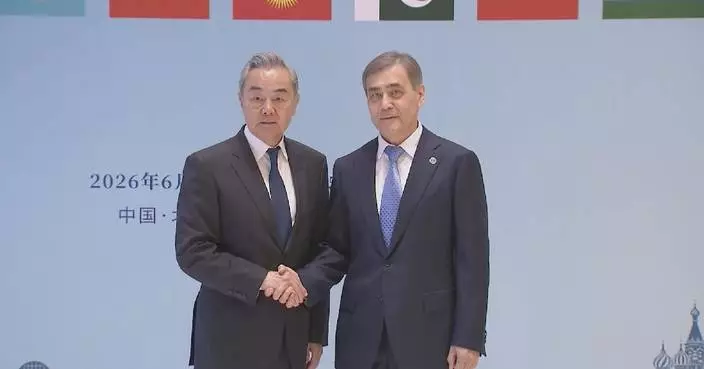 Chinese FM attends reception marking 25th anniversary of SCO