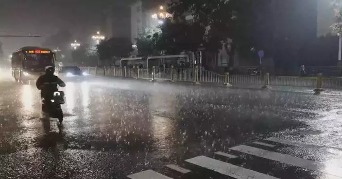 Heavy rain soaks large parts of Beijing