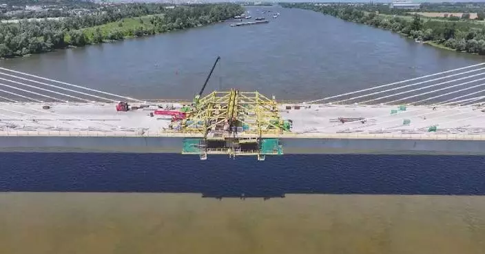 China-aided bridge across Danube River in Serbia topped out