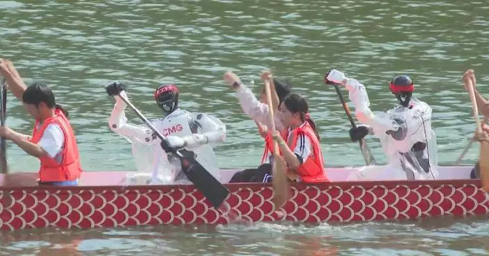 Robots join human paddlers as Dragon Boat Festival traditions go high-tech
