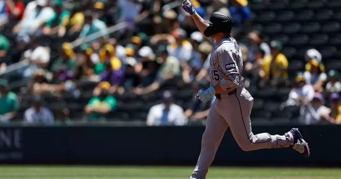 Rockies set club record for runs with 23-9 victory over A’s in Las Vegas heat