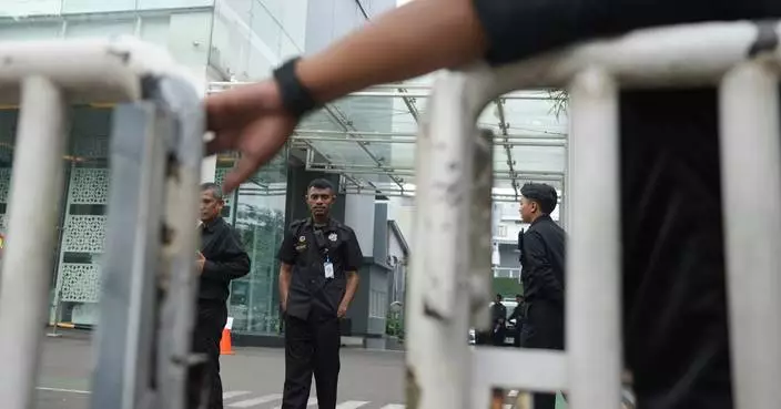 Investigators search Indonesian free meals agency after its leader was fired