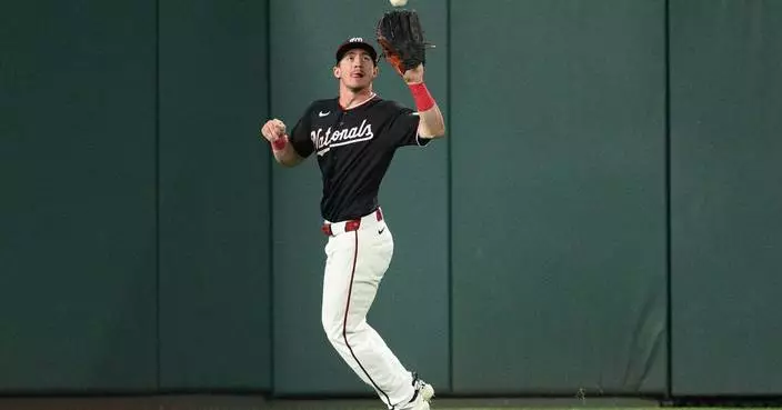 Nationals' Jacob Young leaves game after crashing into outfield wall