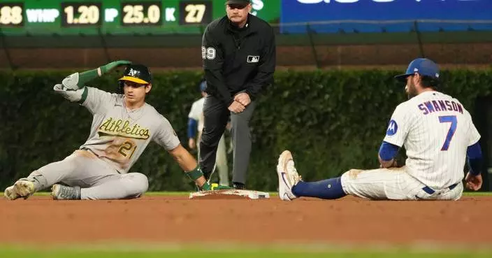 Kurtz drives in winning run in 10th as A’s beat Cubs 5-4; Chicago’s Happ reaches 1,000 career hits