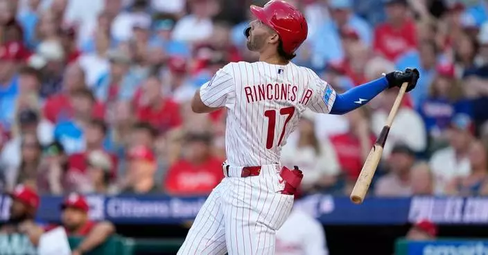 Zack Wheeler strikes out 9 and Rincones homers for first career hit to lift Phillies to 7-0 win