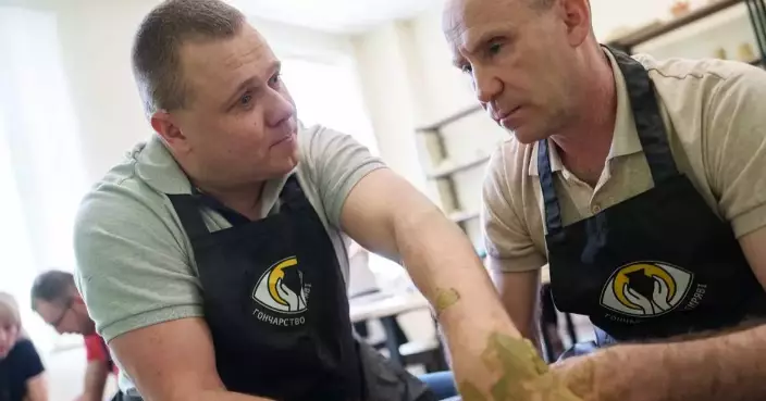 A blind Ukrainian veteran turns pottery into a business and mentors others
