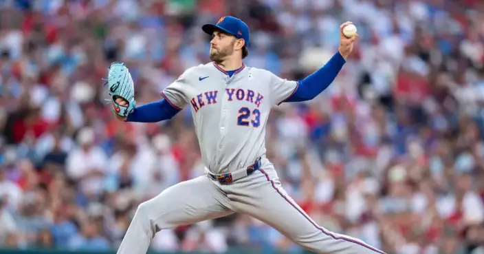 Chicago Cubs acquire left-hander David Peterson in a trade with the New York Mets