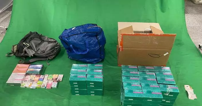 Two Chinese passengers jailed for importing $65,000 in duty-not-paid cigarettes and alternative smoking products in Hong Kong.