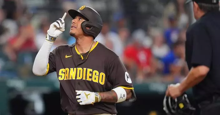 Manny Machado hits a 3-run homer in 10th and has 5 RBIs as Padres beat Rangers 6-4