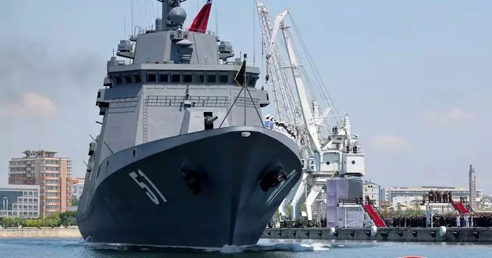 North Korea's Kim claims progress on nuclear-armed navy as new warship is placed into service
