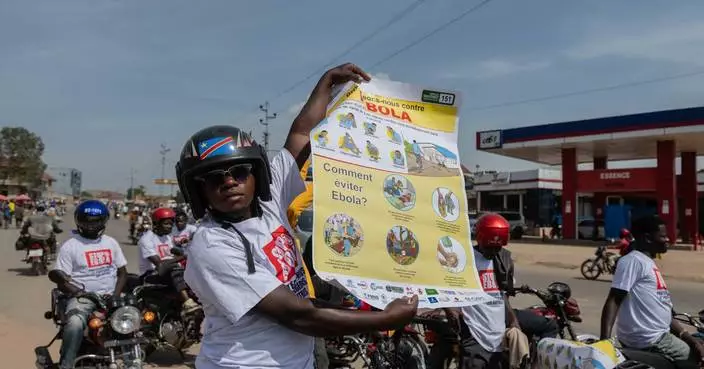 Motorcycle taxi drivers in Congo rally for Ebola awareness as attacks hinder response