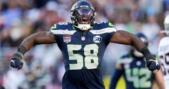 Seahawks and linebacker Derick Hall working toward a 3-year contract extension, AP source says