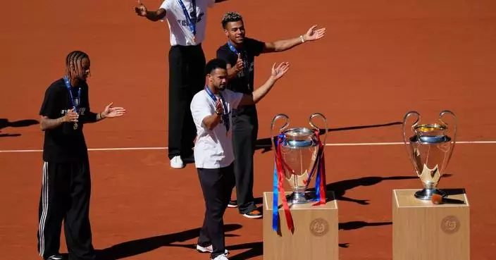PSG stars bring the Champions League trophy to the French Open