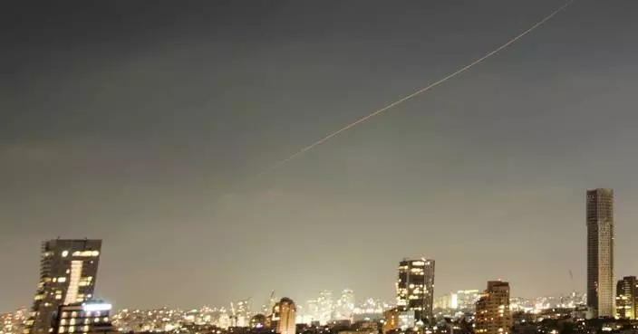 The Latest: Israel launches airstrikes on central and western Iran after Iranian missiles fired