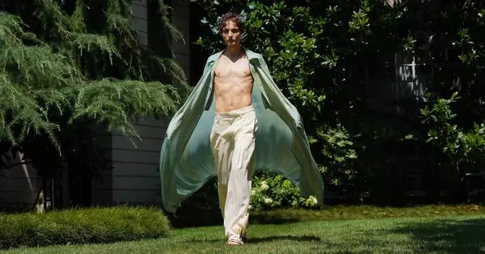Milan designers go lighter in silhouette, if not materials, for next summer