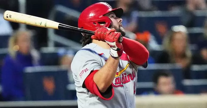 Burleson homers and drives in 3 to back May as Cardinals blank Mets 7-0 for 5th straight win