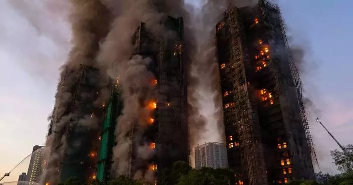 Hong Kong charges 7 people and 2 firms over deadly fire that killed 168