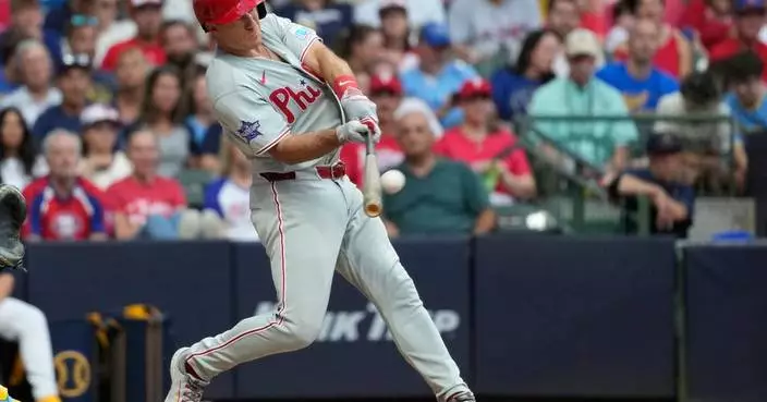 J.T. Realmuto hits 3-run homer in 5-run 6th and Phillies hold off Brewers 9-8
