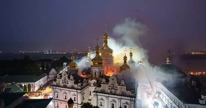 Large-scale Russian attack sparks fire at historic monastery and other sites in Ukraine, in photos