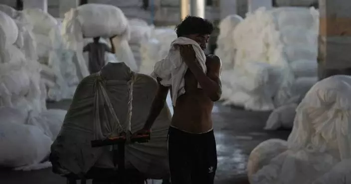 Climate-driven heat in India’s textile factories stifles workers but coolers and ventilation help