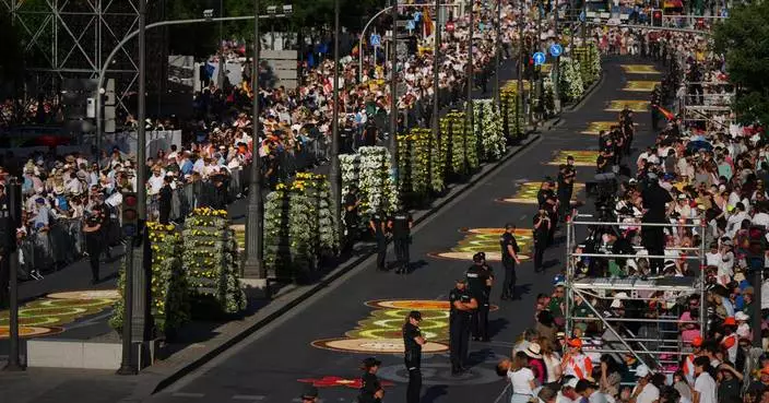 1 million turn out for pope's Mass in Spain and iconic procession along flower-carpeted route