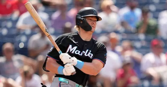 Stowers homers twice, drives in 5 runs to power the Marlins past the Phillies 12-4