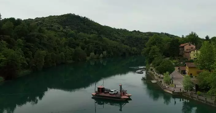 Italian commuters find a moment of peace on a cable-guided ferry sketched by Leonardo da Vinci