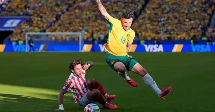 Australia clinches knockout round spot with 0-0 draw; Paraguay also likely to advance