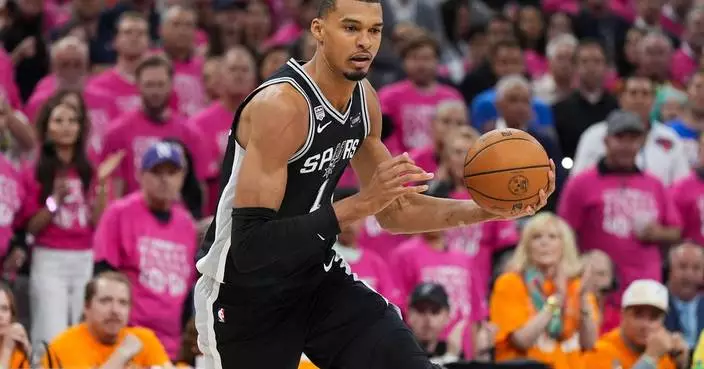 NBA bans two people from arenas after one runs onto court during Game 1, attempts selfie with Wemby
