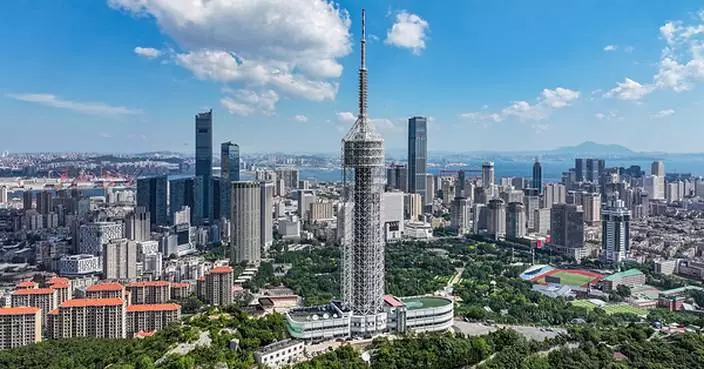 Summer Davos spotlight falls on host city Dalian's economic rise