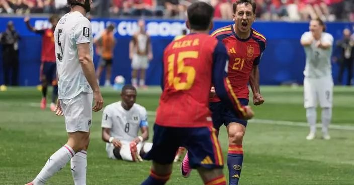 Spain and Austria play for spot in round of 16 at the World Cup, and other highlights, in photos