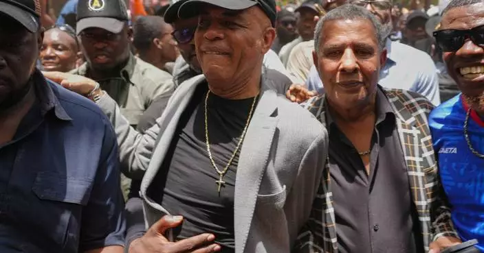 Sanctioned former president Michel Martelly returns to Haiti as some cheer