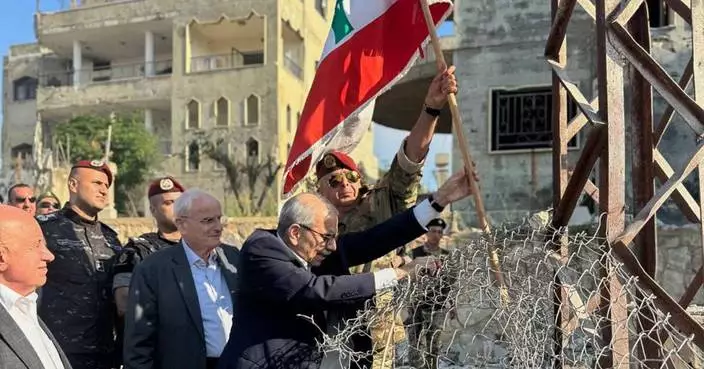 Lebanon's prime minister tours shattered southern village, calls for Israeli military withdrawal