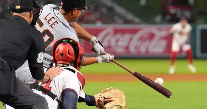 Lee hits clutch double in 9th and Tigers hold on for 2-1 comeback win over Angels