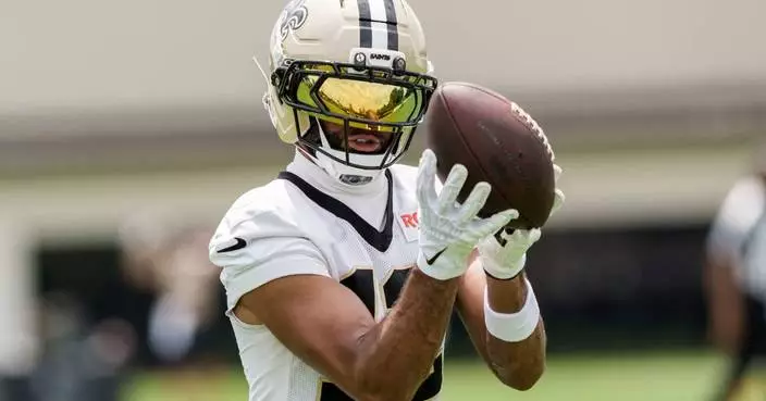 Saints GM Mickey Loomis: receiver Chirs Olave reports for camp as contract negotiations continue