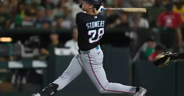Stowers hits 2 of the Marlins' 5 HRs in a 12-5 win over the A's