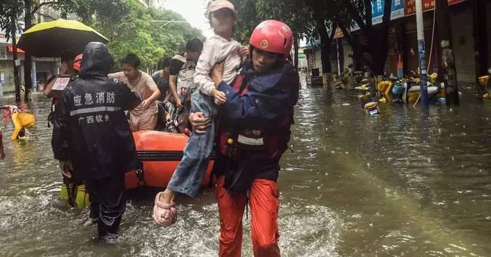 A southern Chinese region reels from floods and destruction from remnants of tropical storm