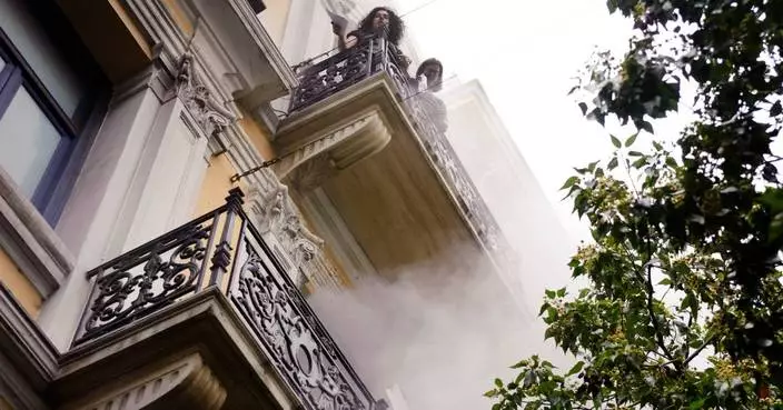 Greek police arrest 2 people over 2010 fatal arson attack on Athens bank