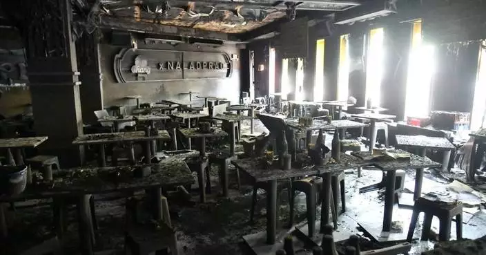 Fire at a music bar in Bangkok kills at least 27 people